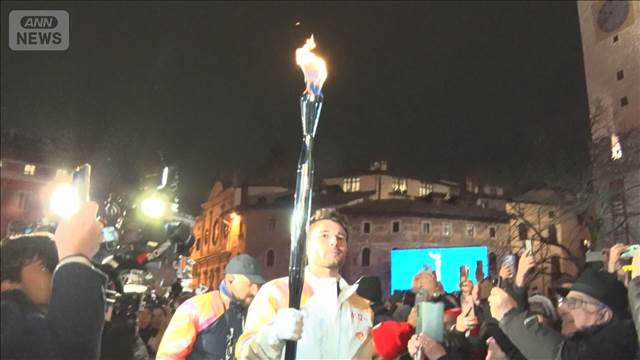 オリンピック開幕まで1週間　聖火がジャンプ競技の町に到着