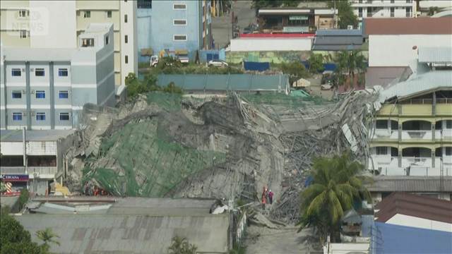 建設中のビル倒壊　2人死亡　18人閉じ込めか フィリピン　